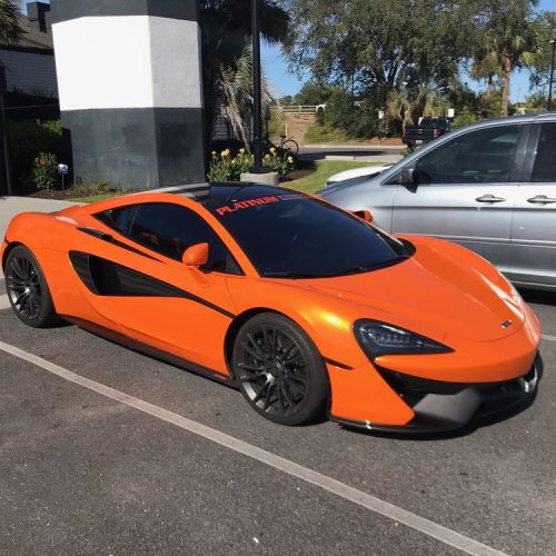 Vehicle Application - orange Lamborghini outside tint shop