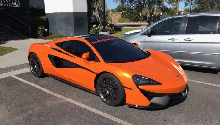 Vehicle Application - orange Lamborghini outside tint shop