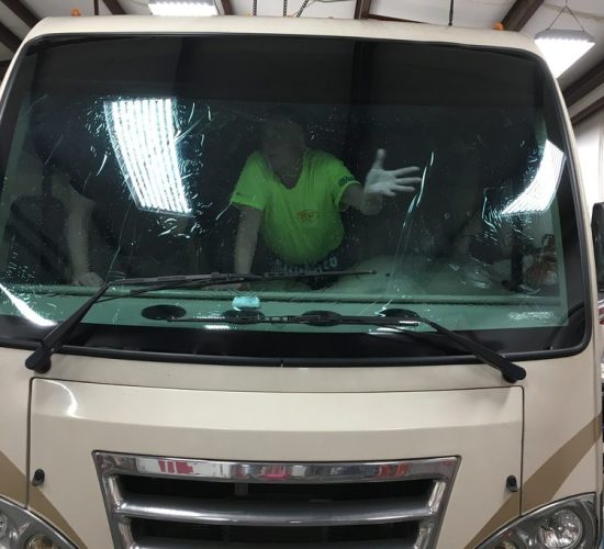 27 - Vehicle Application - White truck inside tint shop garage