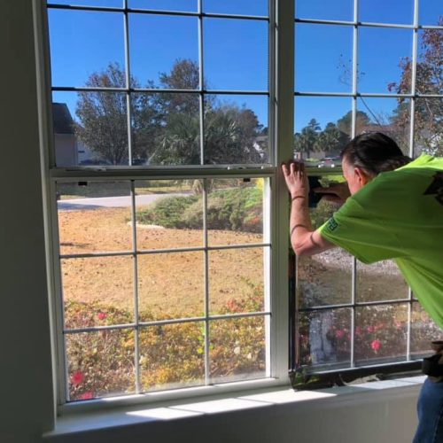 5 - Residential Application - Employee Working on windows